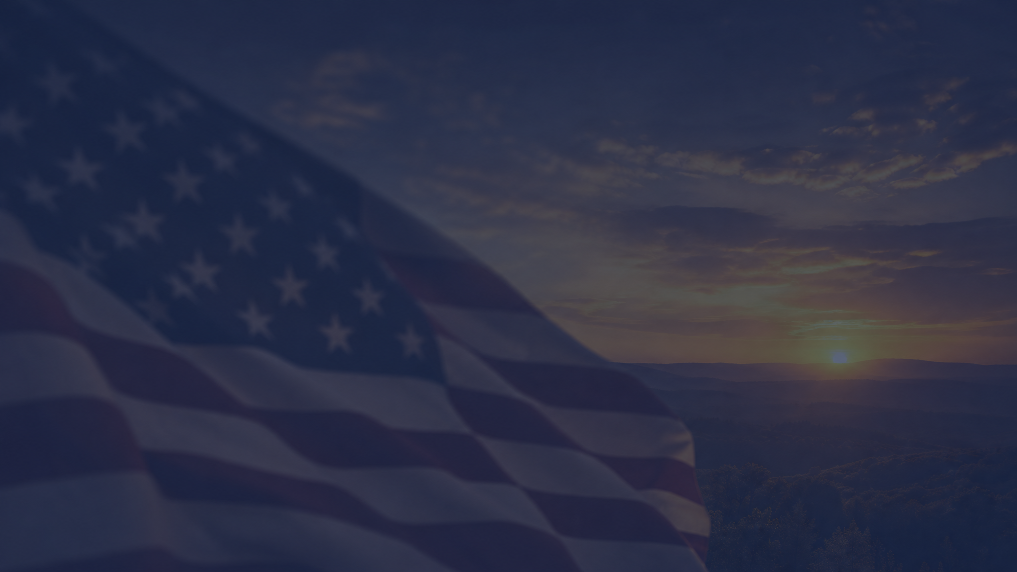 American flag with golden hour lighting over Ozark hills